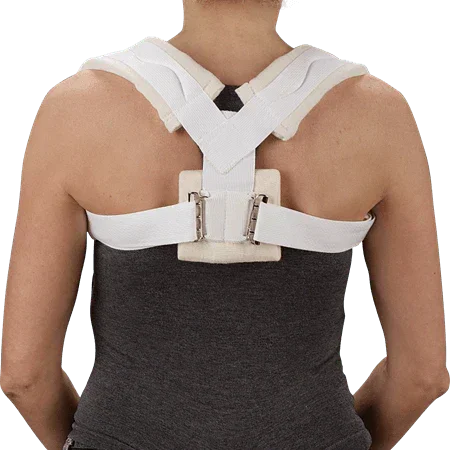 Adjustable clavicle support brace on adult back, white straps for posture correction