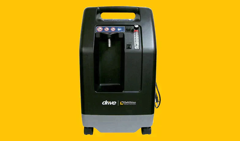 DeVilbiss oxygen concentrator front view on yellow background, medical equipment