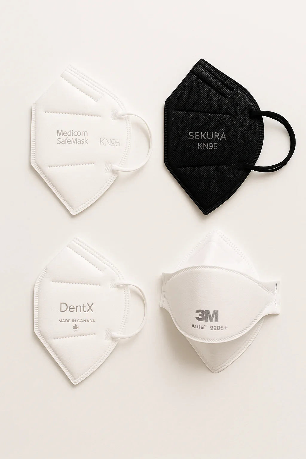 Four protective respirator masks, including KN95, 3M N95, and black and white designs, on white background.