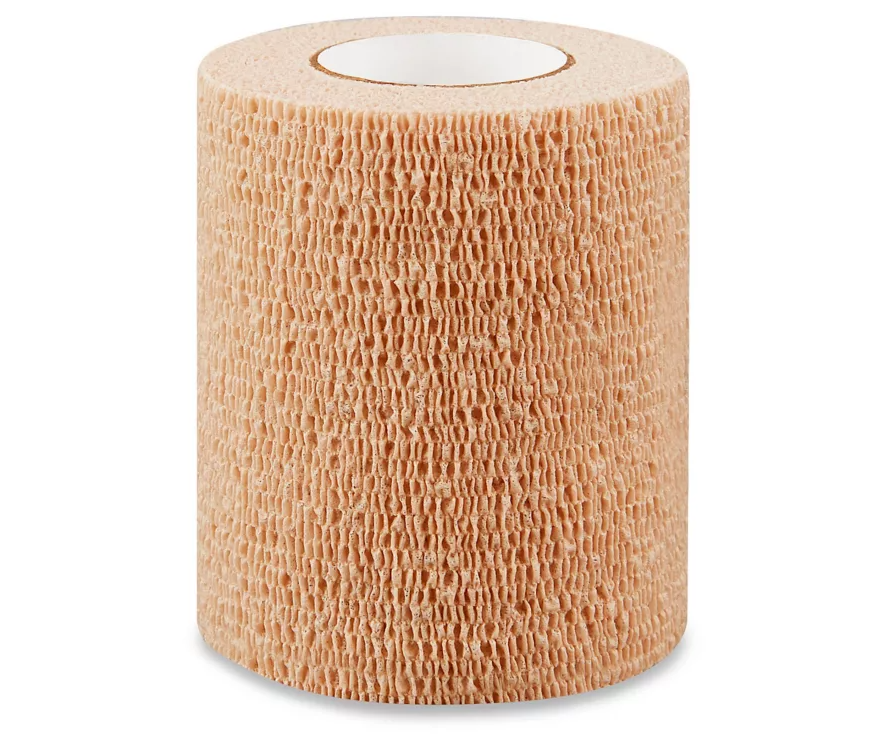 Beige cohesive bandage roll for medical wound care and support
