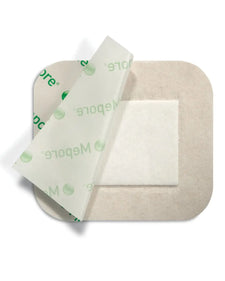 Sterile medical adhesive wound dressing with partially peeled transparent backing