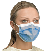 Woman wearing a blue disposable surgical face mask for medical protection