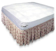 Waterproof mattress protector on bed with floral bed skirt, home care bedding supplies