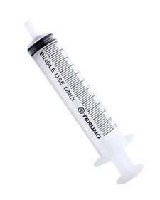 Single use medical syringe with measurement markings and clear barrel on white background