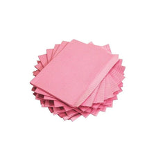 Stack of pink disposable dental bibs for medical or esthetic use on white background