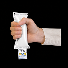Hand holding 2 lb Parsons ADL weight bag for home care therapy