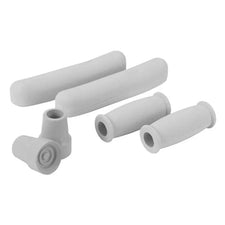 Set of grey foam medical walker hand grips and crutch tips for mobility aid accessories