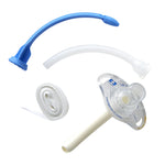 Tracheostomy tube kit with tube, obturator, inner cannula, and securing strap on white background