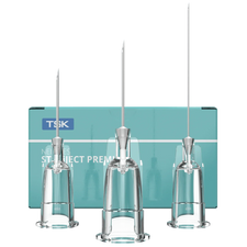 Sterile hypodermic needles with clear caps displayed in front of medical supply box