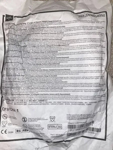 Sterile medical tubing set in sealed packaging with product information and safety symbols.