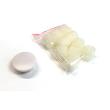 Sterile cotton balls in clear plastic bag with white plastic lid on white background