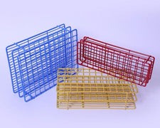 Assorted metal wire baskets in blue, red, and yellow for medical supply storage