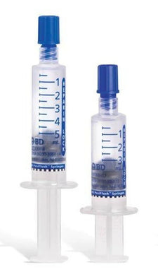 Two heparin flush syringes with blue caps for medical use