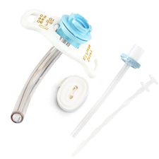 Medical tracheostomy tube with inner cannula, securing strap, and obturator