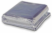 Folded emergency thermal blanket, silver reflective surface, medical supply