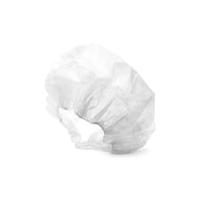 Disposable white bouffant cap for medical or esthetic use on white background