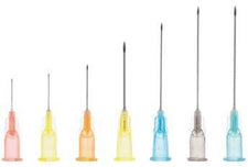 Assorted sterile hypodermic needles in various sizes with colored hubs, medical supplies