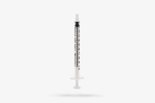 Sterile medical syringe with black measurement markings on a white background