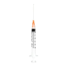 Disposable medical syringe with needle and orange cap on white background