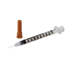 Medical syringe with needle and orange safety cap for home care or clinical use