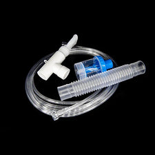 Medical nebulizer kit with tubing, mouthpiece, and medicine chamber on black background