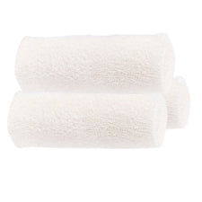 Three white medical gauze rolls for wound care and first aid supplies