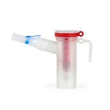 Medical nebulizer cup with mouthpiece and red cap, respiratory therapy accessory