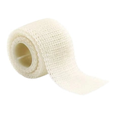 Rolled white medical gauze bandage for wound care and first aid
