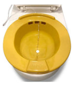 Yellow sitz bath basin with water flow, designed for personal hygiene, home care aid