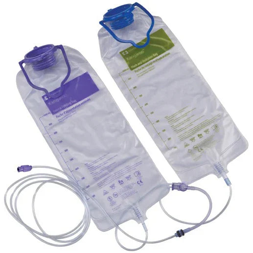 Two sterile medical drainage bags with measurement markings and attached tubing for fluid collection