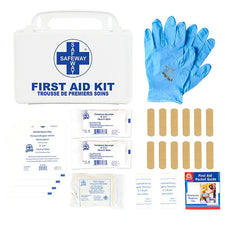 First aid kit with medical supplies, blue gloves, bandages, gauze pads, emergency guide