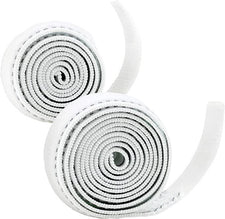 Two white self-adhesive medical bandage rolls, coiled on a white background