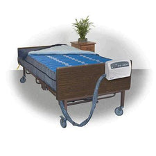 Hospital bed with therapeutic air mattress and control unit in a home care setting