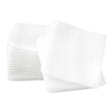 Sterile white gauze pads for wound care and medical use, stacked on a plain background