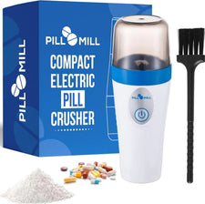 Compact electric pill crusher kit with cleaning brush, assorted pills, and powder pile