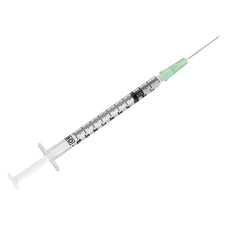 Sterile disposable medical syringe with clear barrel and green needle on white background