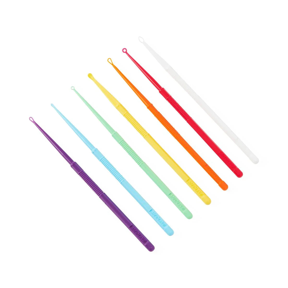 Set of seven colorful plastic medical comedone extractors arranged in a row on white background