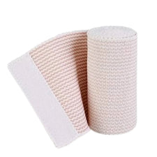 Elastic bandage roll with Velcro closure, beige, used for compression or support