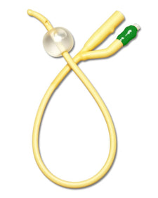Yellow Foley catheter with green valve and clear balloon for medical use