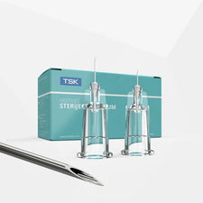 Sterile hypodermic needles with clear caps and blue box, medical injection supplies