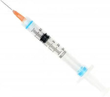Disposable medical syringe with needle, clear barrel and graduated measurement marks