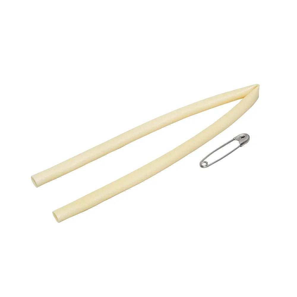 Rubber tubing with safety pin, medical supply, isolated on white background