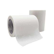 White medical paper tape rolls for wound care and bandage securement
