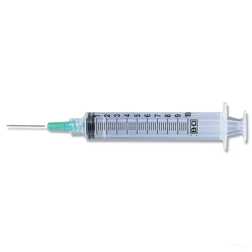 Sterile medical syringe with clear barrel and green needle, used for healthcare applications
