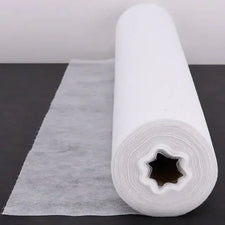 Disposable nonwoven bed sheet roll for medical or esthetic treatment tables