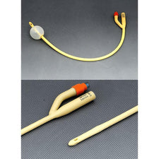 Latex Foley catheter with inflatable balloon and dual ports on gray background