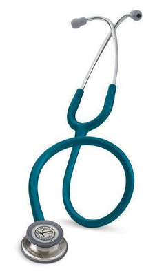 Blue medical stethoscope with stainless steel chest piece on white background