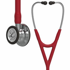 Red medical stethoscope with stainless steel chestpiece and black ear tips, isolated on white.