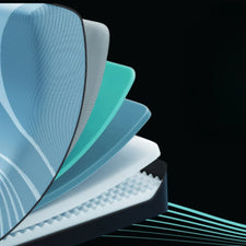 Layered medical mattress cross-section showing foam and textured comfort layers