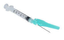 Sterile medical syringe with needle and safety cap on white background